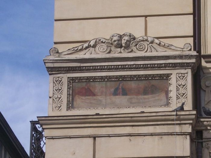 Affresco raffigurante la Sacra Sindone, all'angolo di Piazza San Carlo con via Vittorio Alfieri.
